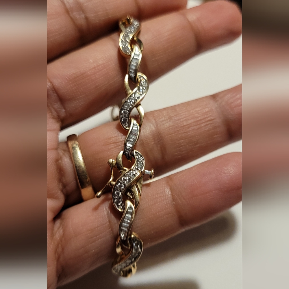 14k gold and diamond bracelet.
